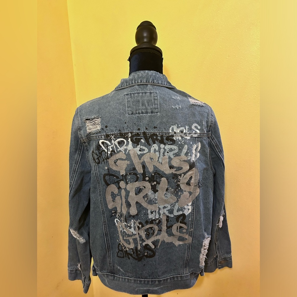 distressed graffiti denim jacket